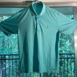 Masters tech polo. DriFit material and is a mens large.
